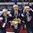 PLYMOUTH, MICHIGAN - APRIL 6: Team U.S.A's Kacey Bellamy #22, Meghan Duggan #10 and Monique Lamoureux #7 celebrate with the championship trophy following a 3-2 overtime win against team Canada during the gold medal game at the 2017 IIHF Ice Hockey Women's World Championship. (Photo by Minas Panagiotakis/HHOF-IIHF Images)